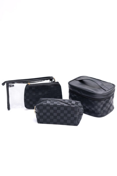 Set 4 tas kosmetik bermotif kotak-kotak halus berwarna hitam.